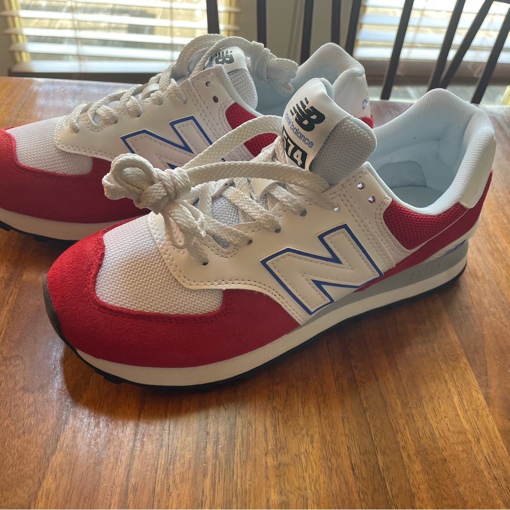 New Balance 574 Red, white, and blue sneakers. Never worn! Women’s 8.5 / Men’s 7